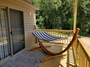 Tiny home with hammock loft BBQ and yard